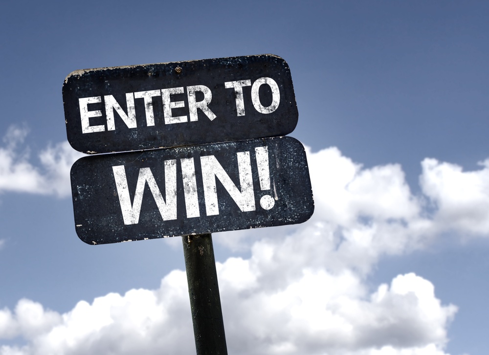 Enter To Win Sign With Clouds And Sky Background
